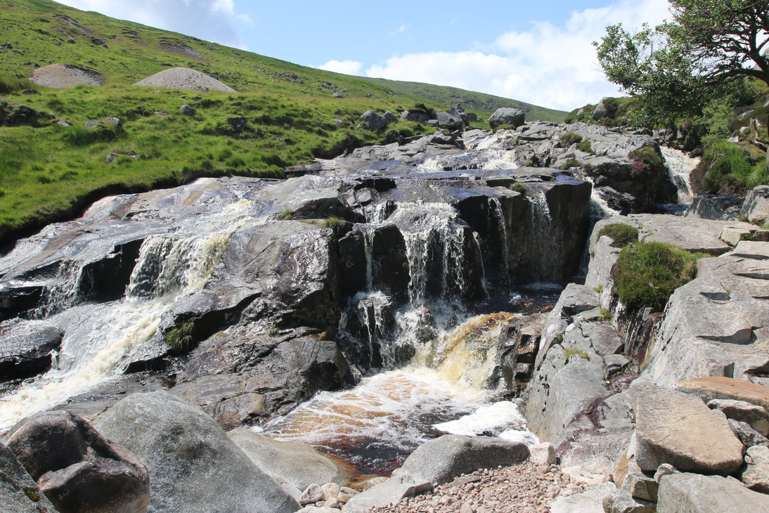 Beside the stream flowing down Glendalough